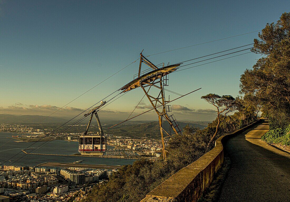  Driveway in the Upper Rock Nature Reserve of Gibraltar, cable car on the way to the mountain station, view of the harbor and the bay of Algeciras, Gibraltar, British Crown Colony, Spain 