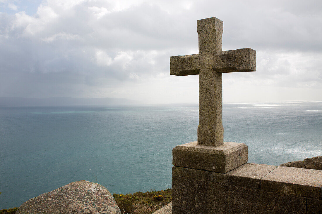  Stone cross at Cape Finisterre at the end of the Way of St. James, Galicia, Spain 