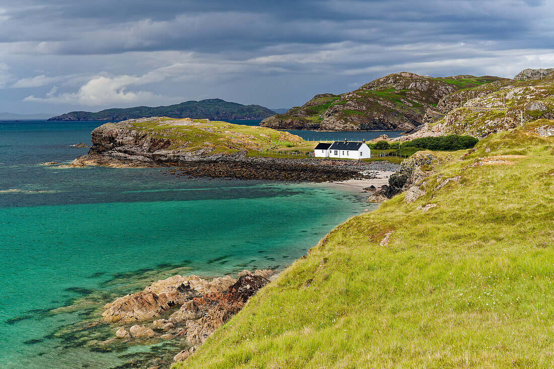  Great Britain, Scotland, North West Highlands, house on the coast in front of Drumbeg 