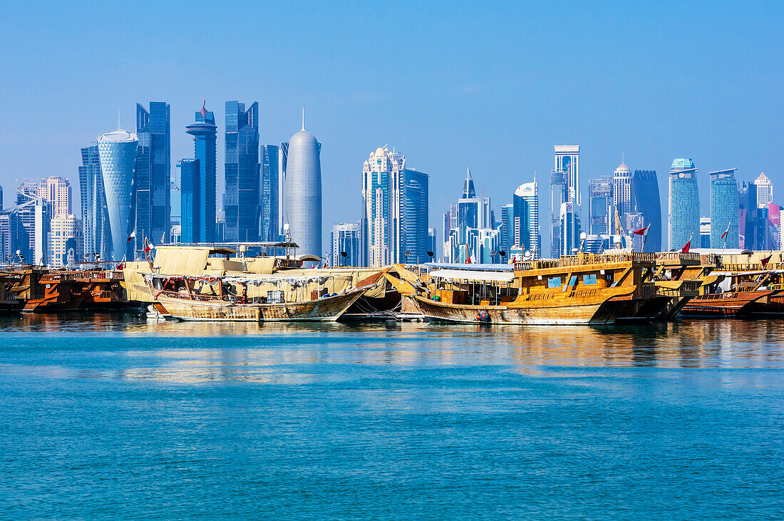  Harbor views with skyscrapers and ships in Doha, capital of Qatar in the Persian Gulf. 