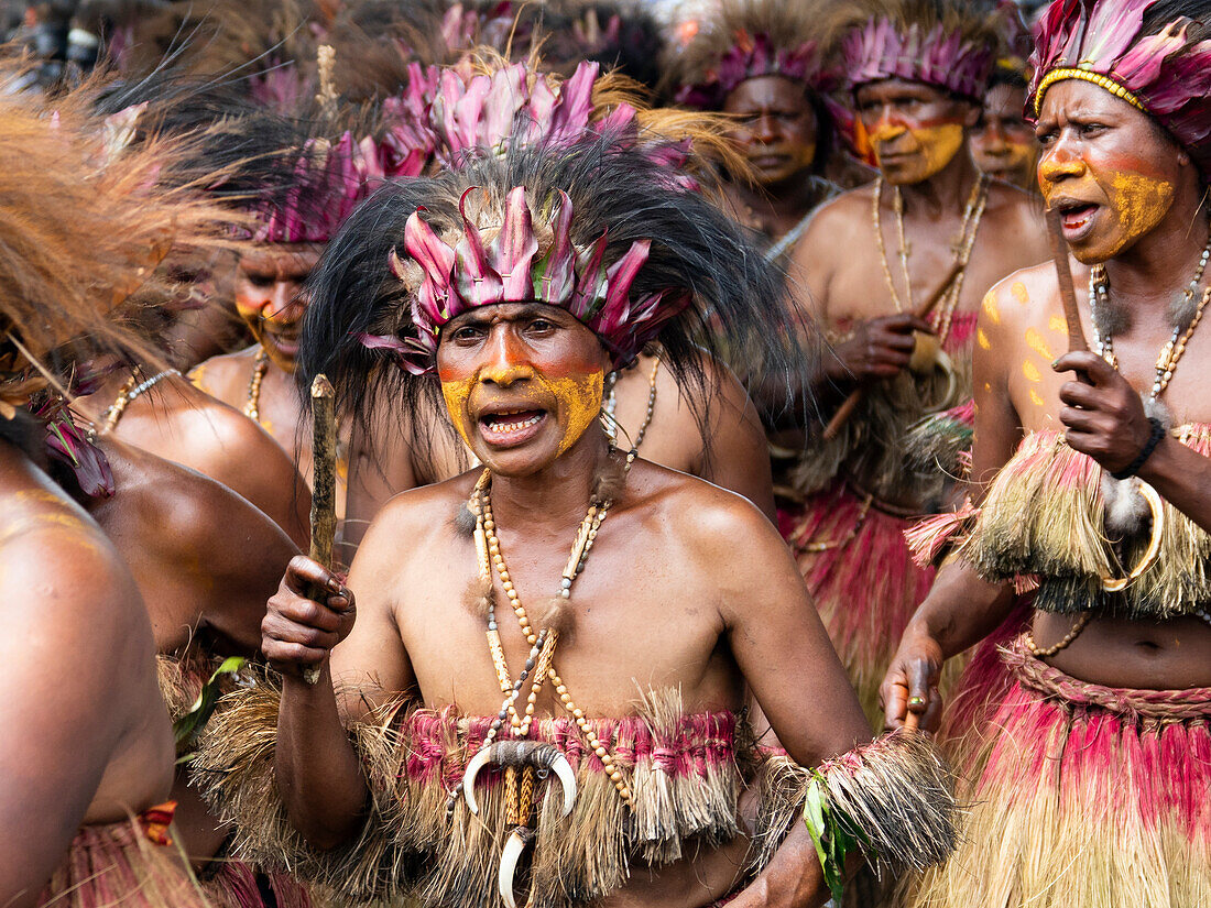  Women, tribe in traditional costume, singing, Morobe Show, Lae, Papua New Guinea 