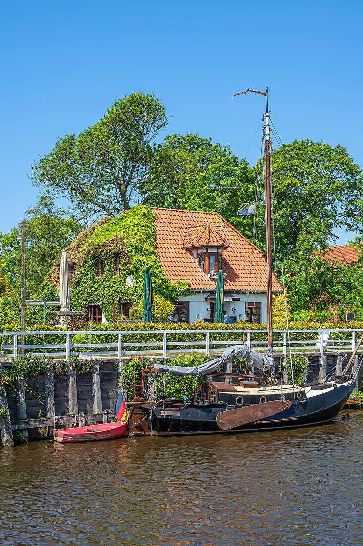  Cafe in the museum harbor in Carolinensiel, East Frisia, Lower Saxony, Germany 