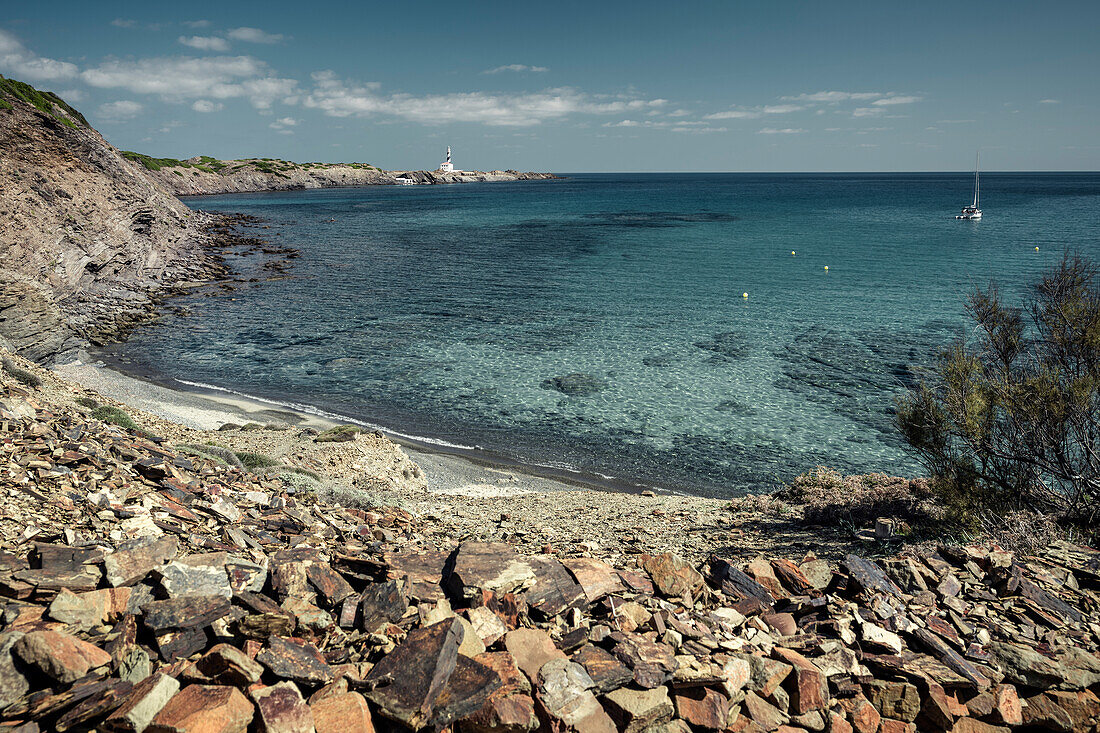  Sea bay &quot;Cala Presili&quot; with lighthouse at Cap de Favàritx, Menorca, Balearic Islands, Spain, Europe 