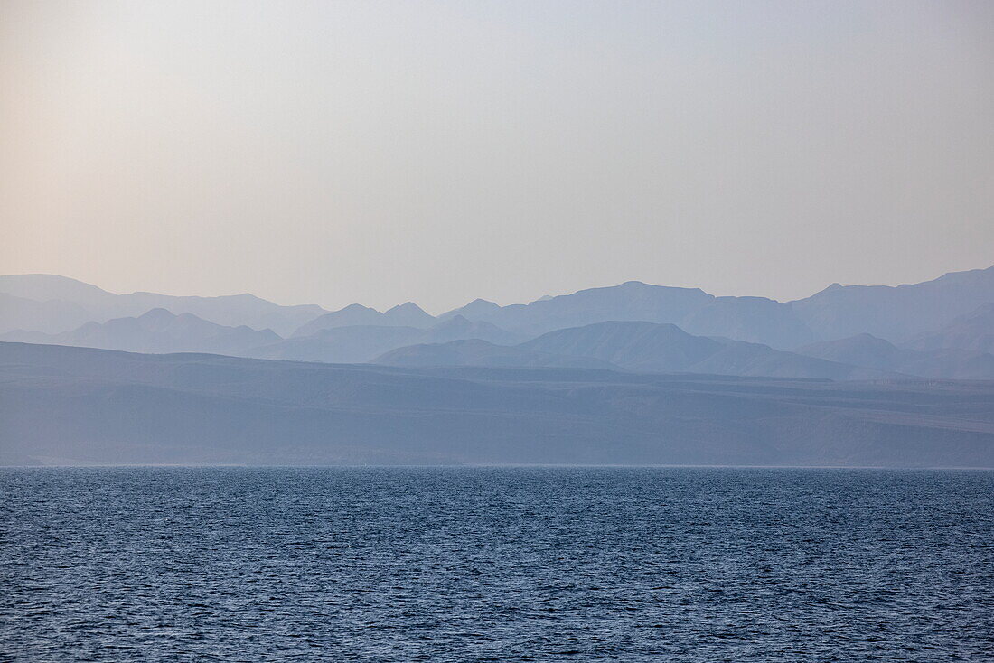  Coastline with mountains, seen during the passage of the Bab-el-Mandeb Strait between the Arabian Peninsula and Djibouti, at sea, near Yemen, Middle East 
