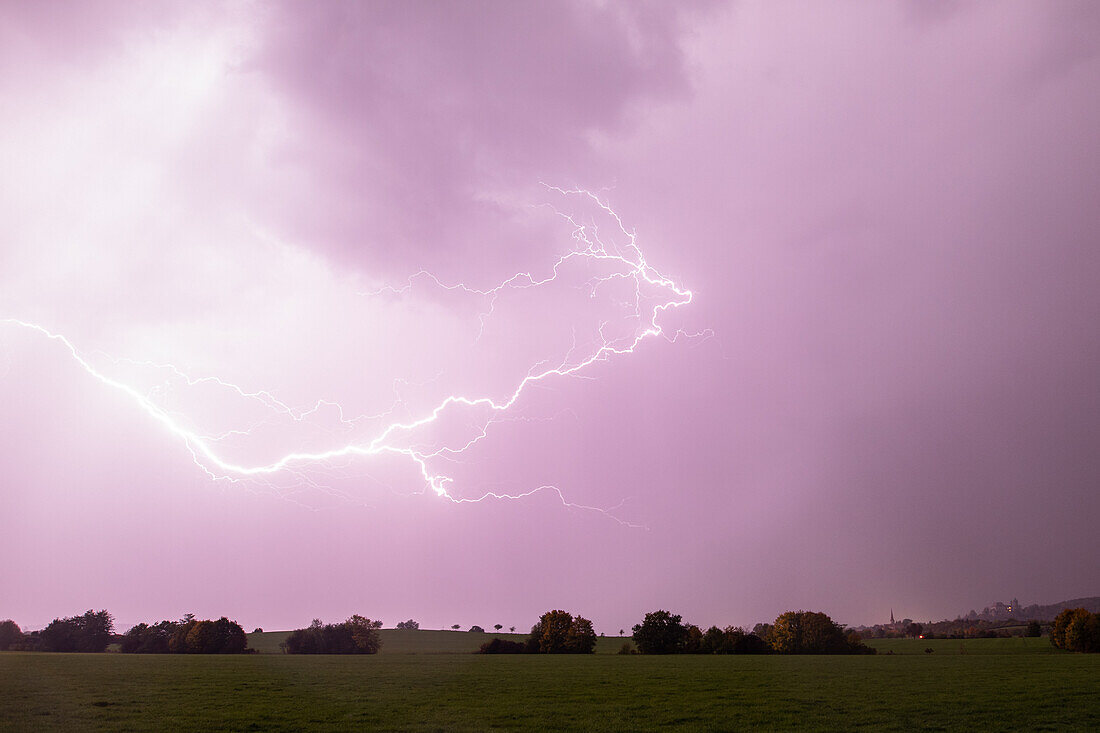  Lightning over Colmberg in autumn, Ansbach, Middle Franconia, Franconia, Bavaria, Germany, Europe 