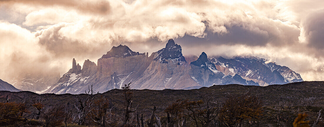 Panorama of Torres del Paine mountain range with dramatic clouds, Torres del Paine National Park, Chile, Patagonia, South America 