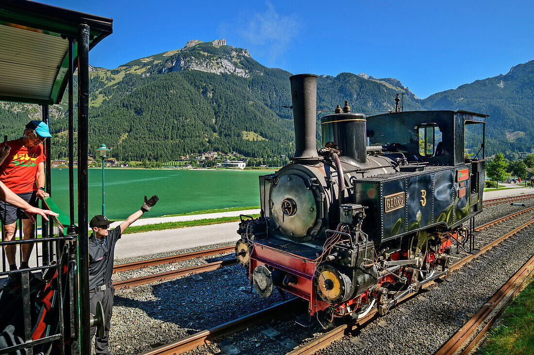  Steam locomotive of the Achenseebahn docks with the train, Achensee, Tyrol, Austria 