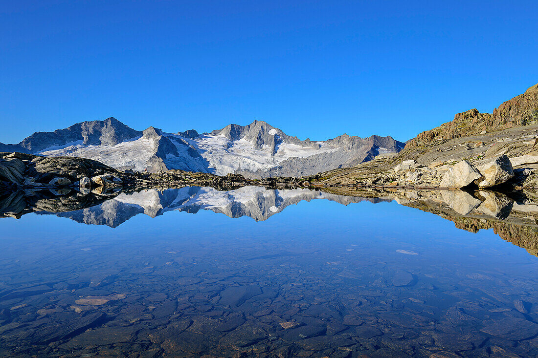  Turnerkamp and Großer Möseler are reflected in mountain lake, from Berliner Höhenweg, Zillertal Alps, Zillertal Alps Nature Park, Tyrol, Austria 