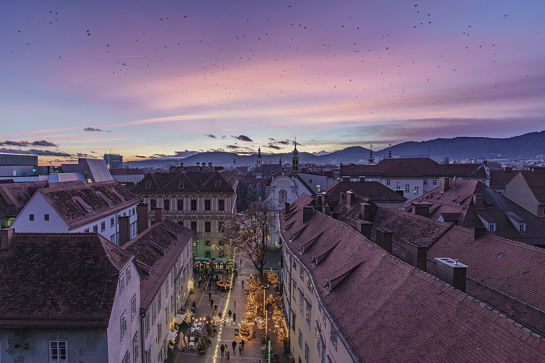  View from the Schlossberg to a Christmas market in the old town of Graz, Styria, Austria. 