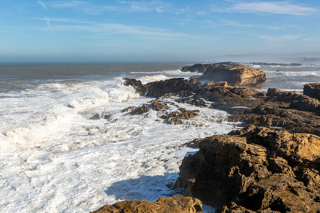 Large waves breaking on rocky shore, Essaouira, Morocco, north Africa