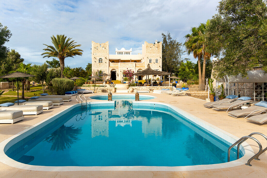 Out of Medina riad hotel swimming pool and building,  Bouzama,  Essaouira, Morocco, north Africa