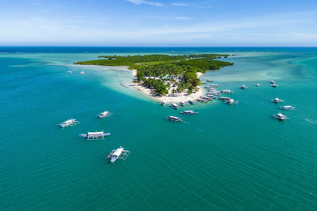  Aerial photographs of Bangka outrigger canoe tour boats on Cowrie Island, Honda Bay, near Puerto Princesa, Palawan, Philippines 