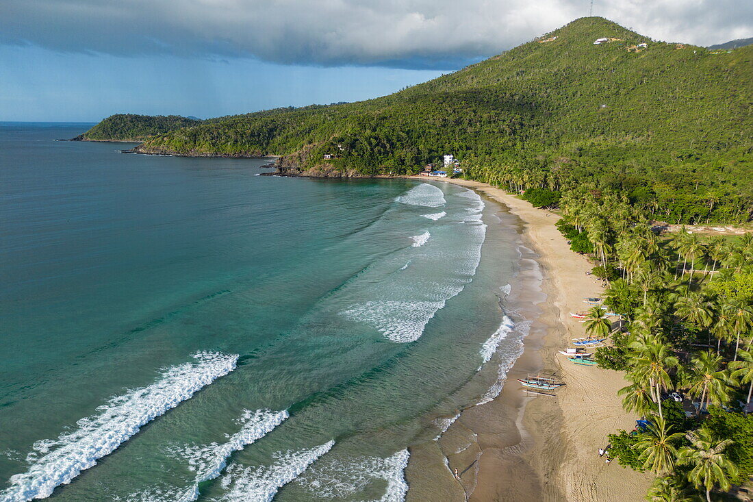  Aerial view of bay with Nagtabon Beach and mountains, Bacungan, near Puerto Princesa, Palawan, Philippines 