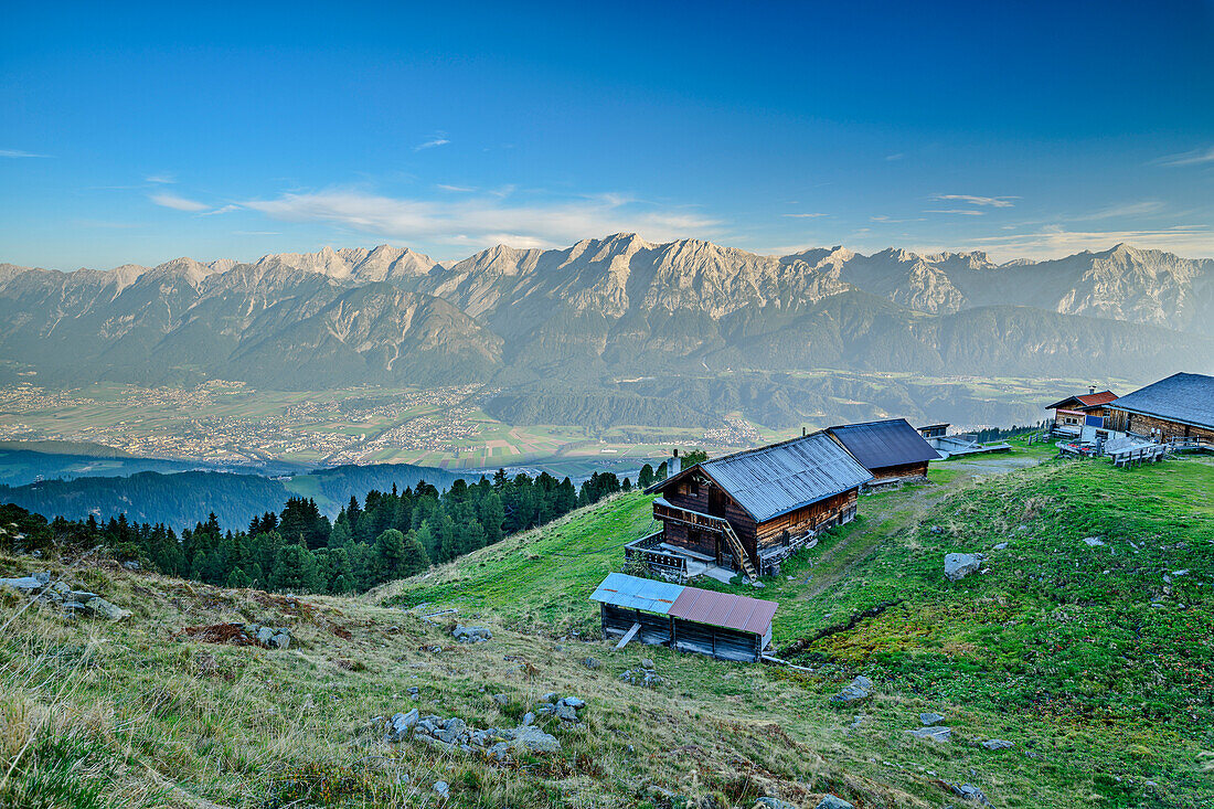  Alpine settlement of the Largozalm with a view over the Inn Valley to the Karwendel range, Largozalm, Rosskopf, Tux Alps, Tyrol, Austria 