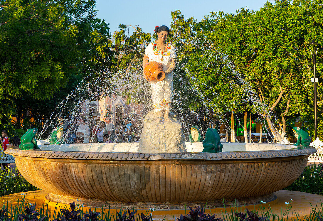 Female Mayan figure woman holding water jug in fountain, Francisco Cantón Rosado Park, Valladolid, Yucatan, Mexico