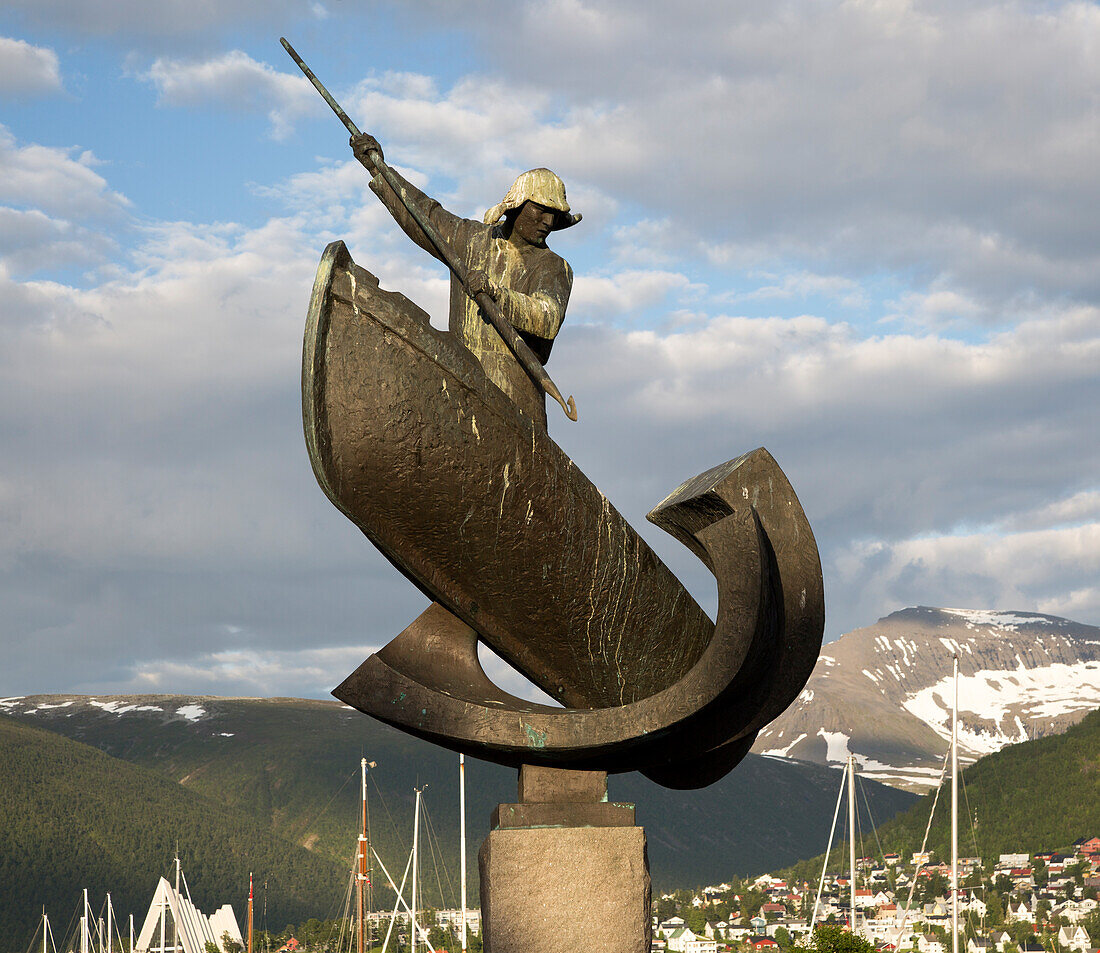 Whaling harpooning sculpture in harbour at Tromso, Norway