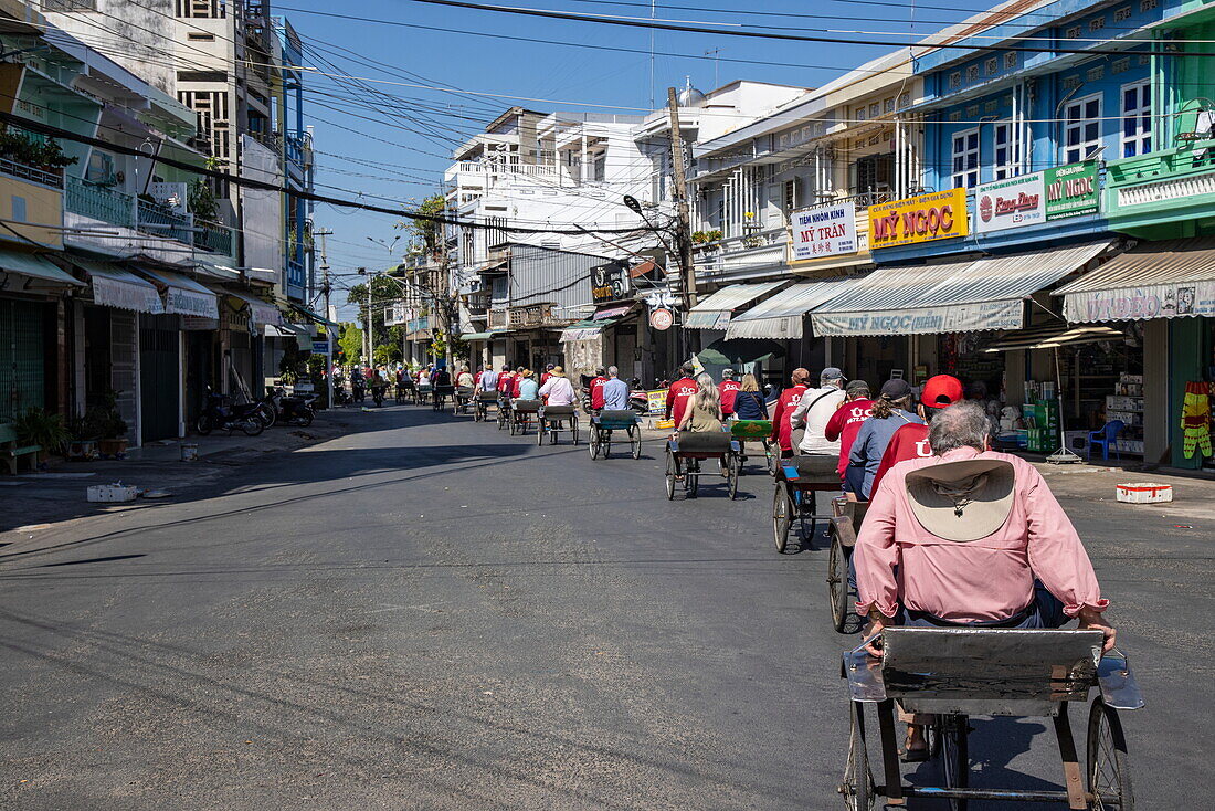  Cycle rickshaw tour for passengers of the river cruise ship The Jahan (Heritage Line), Tan Chau (Tân Châu), An Giang, Vietnam, Asia 