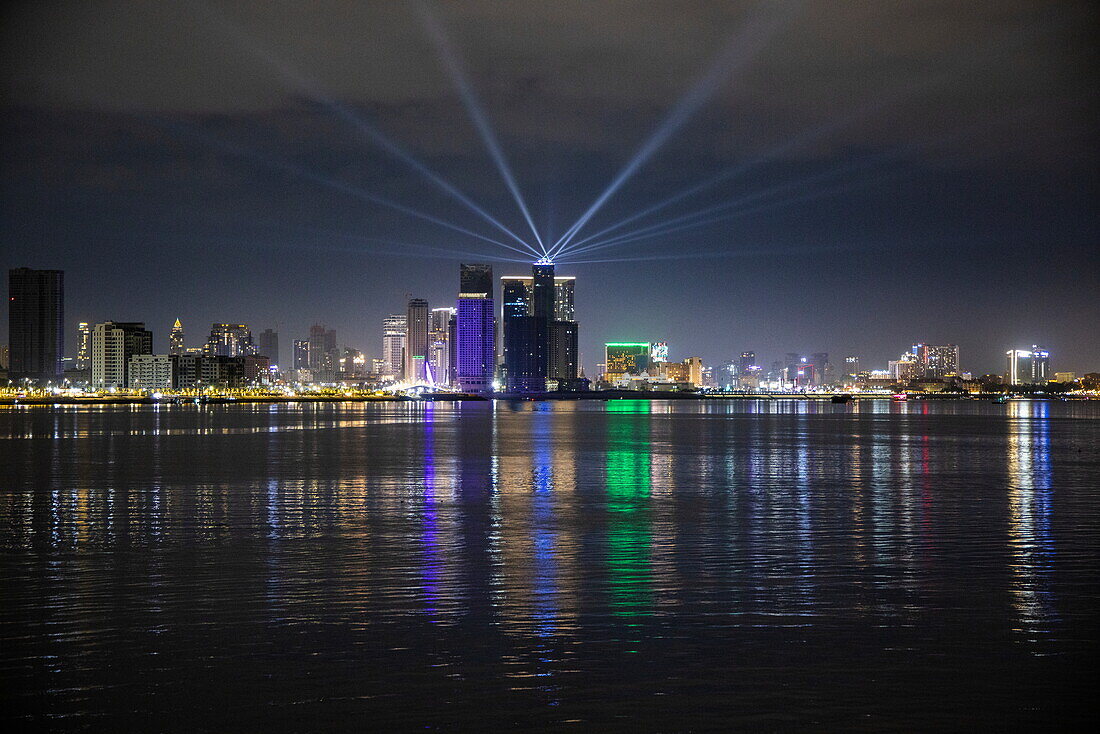  Skyline and city lights seen from board the river cruise ship The Jahan (Heritage Line) on the Mekong at night, Phnom Penh, Phnom Penh, Cambodia, Asia 