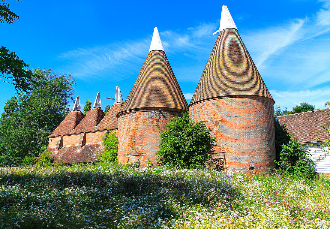 Historic oast house buildings at Sissinghurst castle gardens, Kent, England, UK