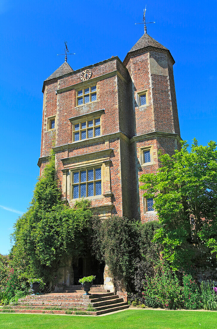 Red brick tower and blue sky Sissinghurst castle gardens, Kent, England, UK