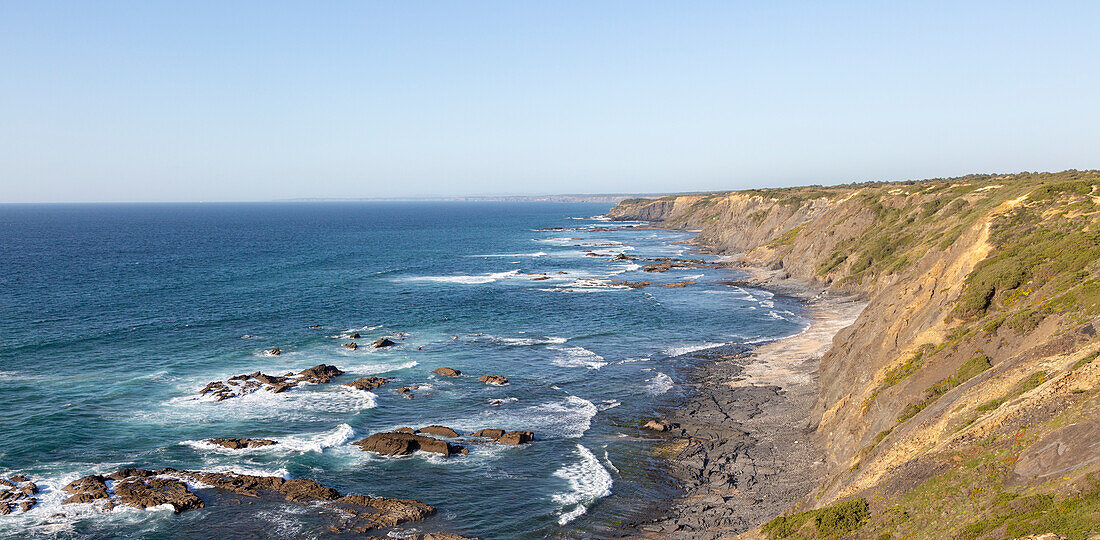 Rocky rugged coastal landscape on the Rota Vicentina Fisherman's Trail long distance footpath route, near Bunheira, Aljezur, Algarve, Portugal, Southern Europe