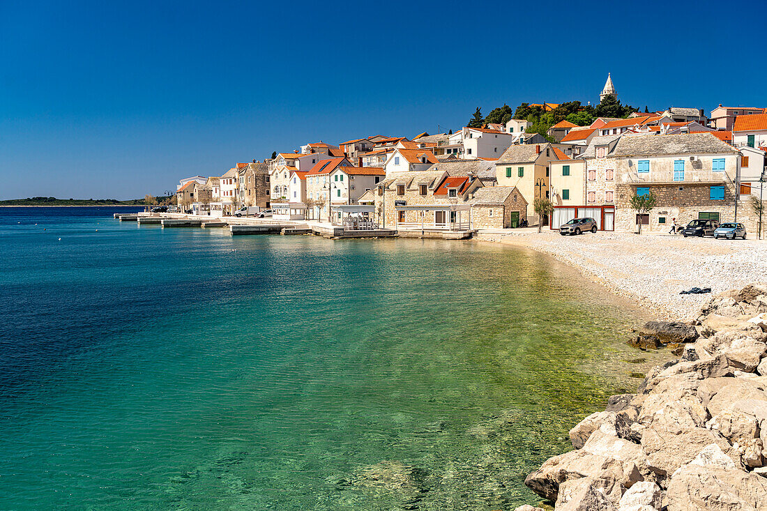  Beach and old town of Primosten, Croatia, Europe  