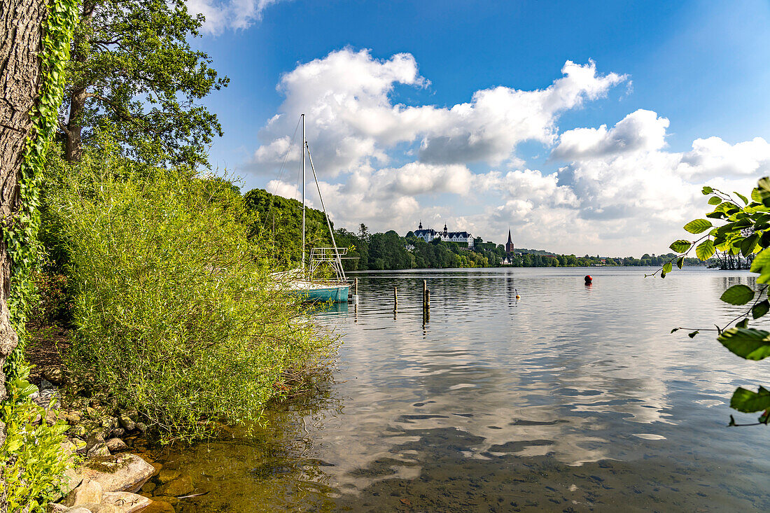  The Great Plön Lake, St. Nicholas Church and Plön Castle in Plön, Schleswig-Holstein, Germany  