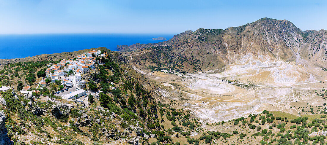  View from the church of Profitis Ilías to the mountain village of Nikiá and the caldera on the island of Nissyros (Nisyros, Nissiros, Nisiros) in Greece 