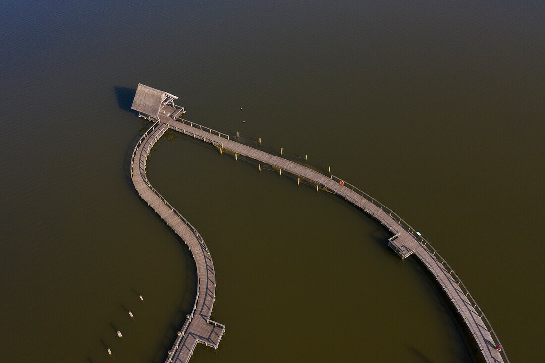  Pier at Hemmelsdorfer See at sunrise, spring, Schleswig-Holstein, Germany 