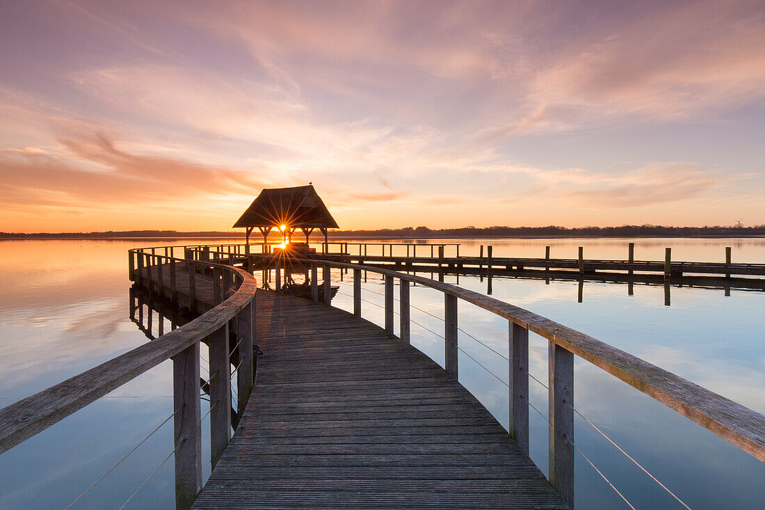  Pier at Hemmelsdorfer See at sunrise, spring, Schleswig-Holstein, Germany 