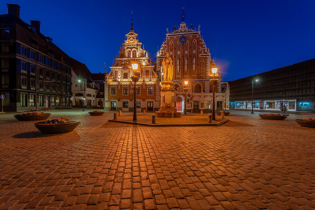  House of the Blackheads in the morning at blue hour, Town Hall Square, on the right Occupation Museum, Riga, Latvia 