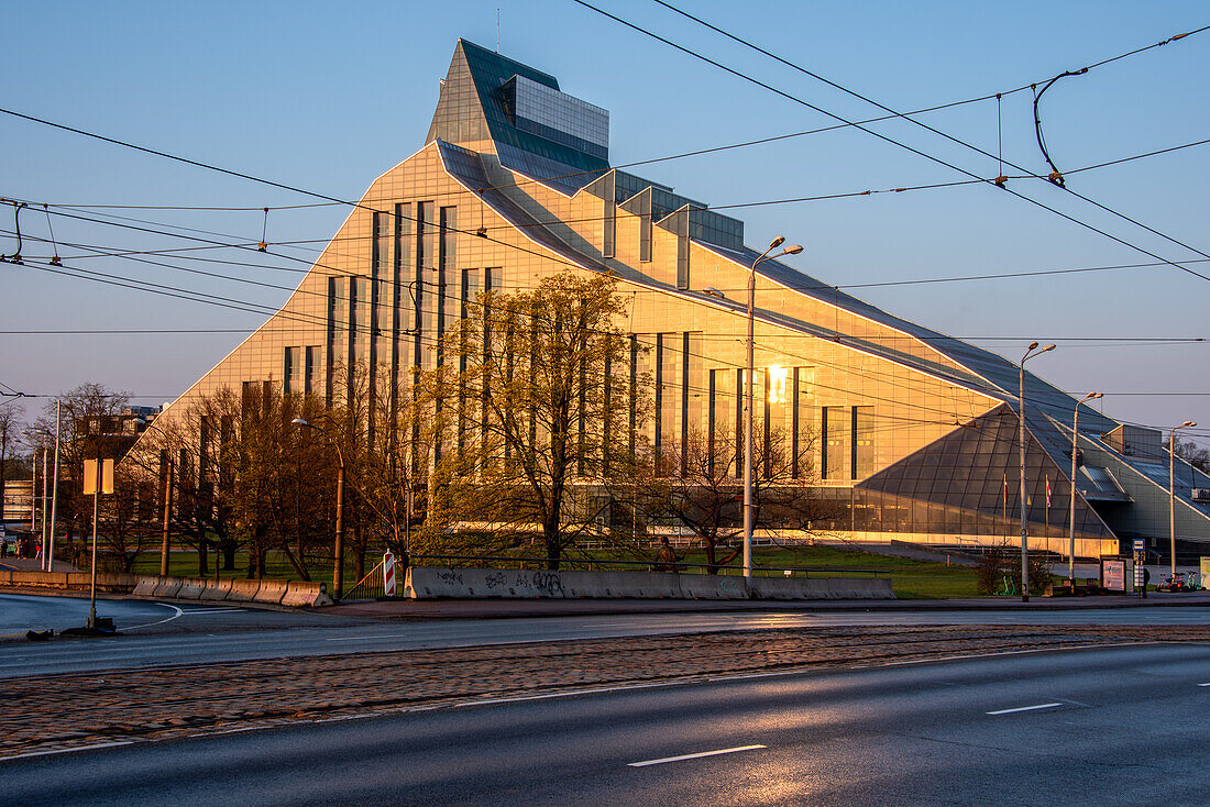  Latvian National Library in the golden light of the morning sun, designed and built by Latvian-born US architect Gunars Birkerts, Riga, Latvia 