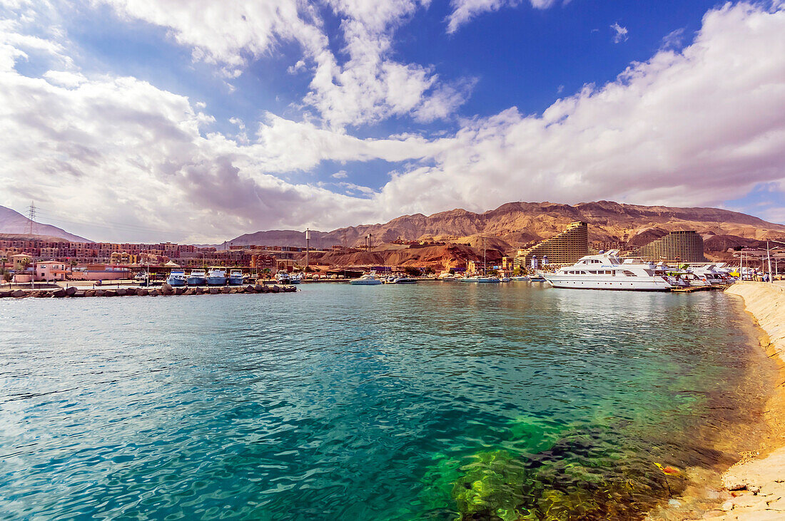  Ain Sukhna (Sokhna ) is a tourist resort located on the bay of Ghubbat al-Būṣ on the west coast of the Gulf of Suez 