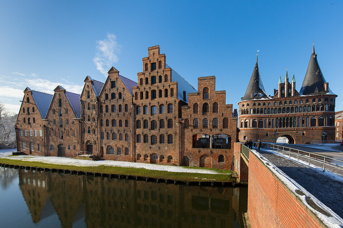  Salt storage and Holsten Gate in the snow, Hanseatic City of Luebeck, Schleswig-Holstein, Germany 