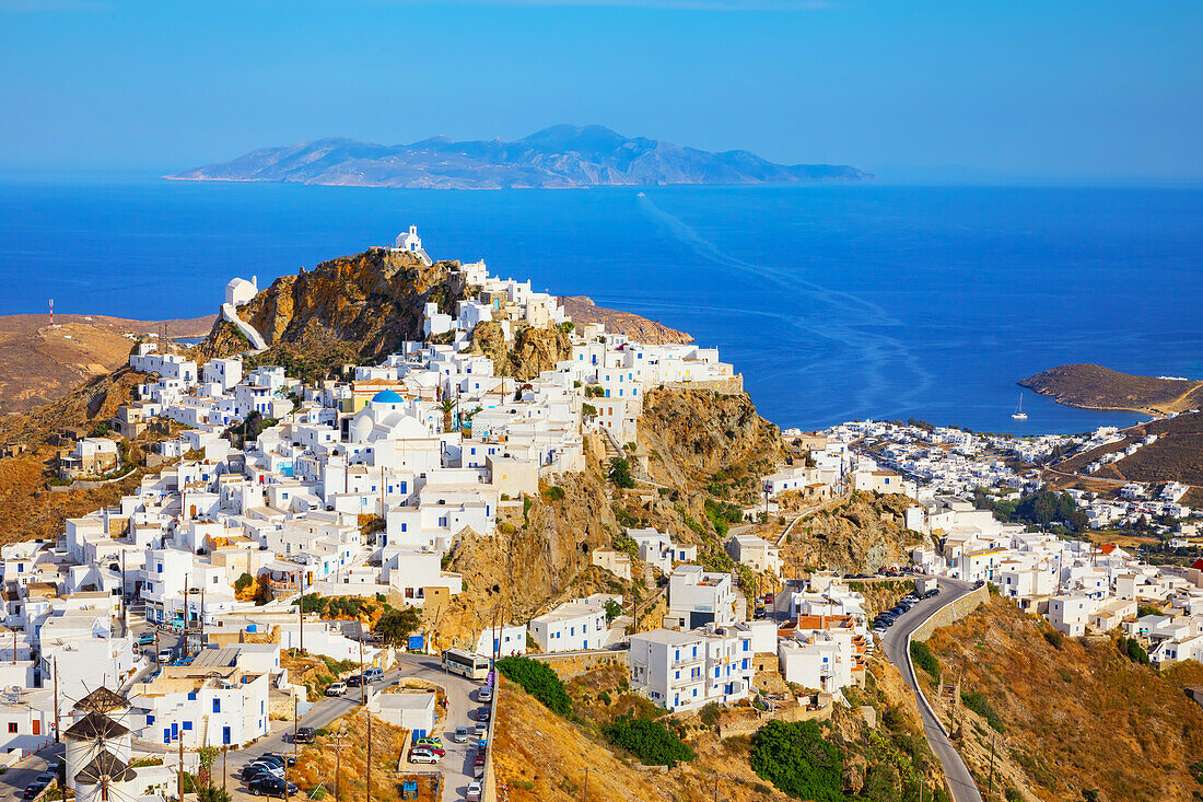 View of Chora village and the port of Livadi and Sifnos island in the distance, Chora, Serifos Island, Cyclades Islands, Greece