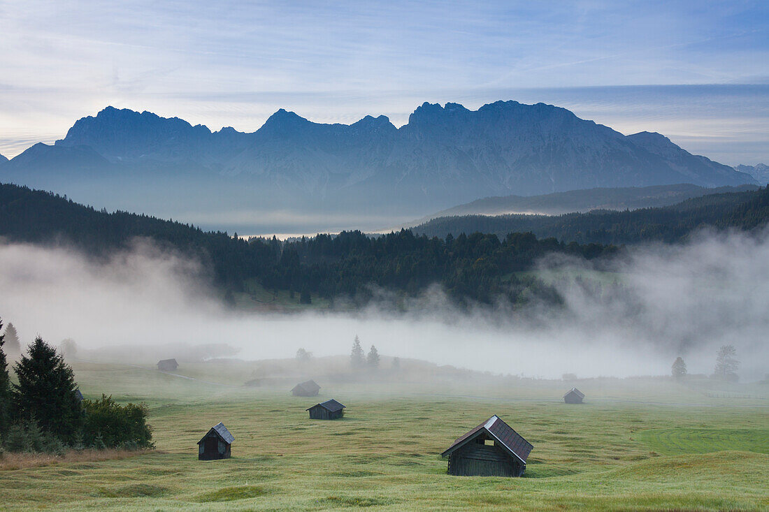  Morning mist at Geroldsee with Karwendel Mountains, Werdenfelsener Land, Upper Bavaria, Bavaria, Germany 