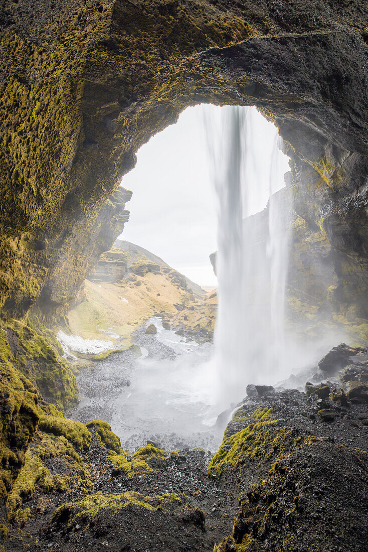  View from behind the Kvernufoss waterfall, winter, Iceland 