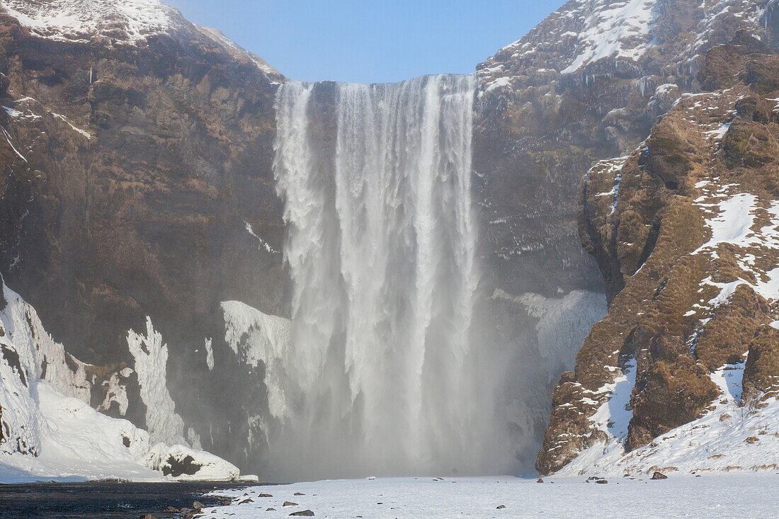  Skogafoss, 63m high waterfall, winter, Iceland 