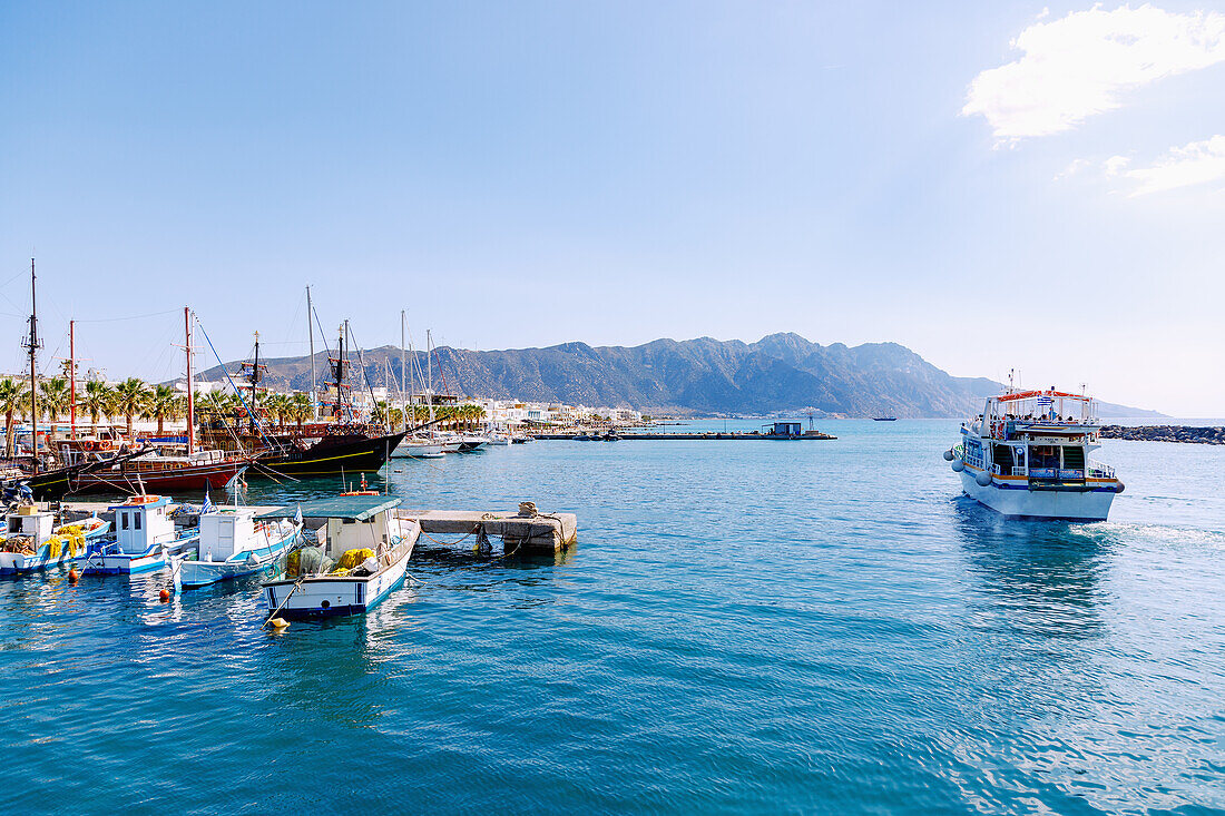  Fishing boats and excursion boats in the harbor in Kardamena on the island of Kos in Greece 