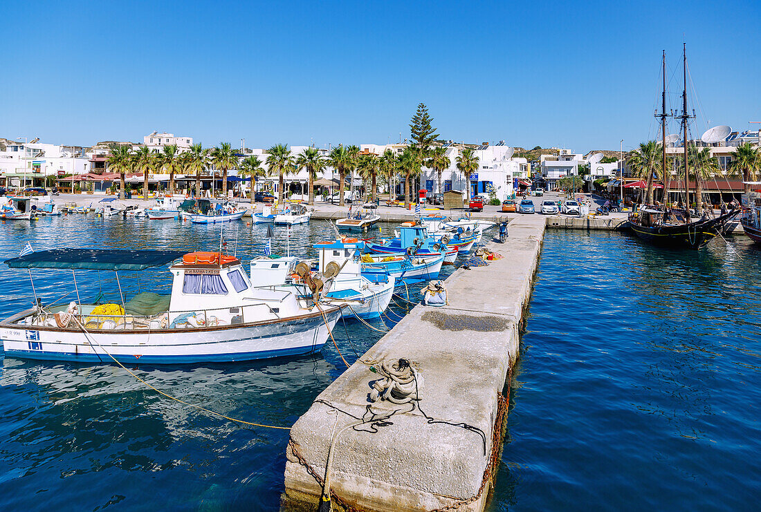  Fishing boats and excursion boats in the harbor in Kardamena on the island of Kos in Greece 