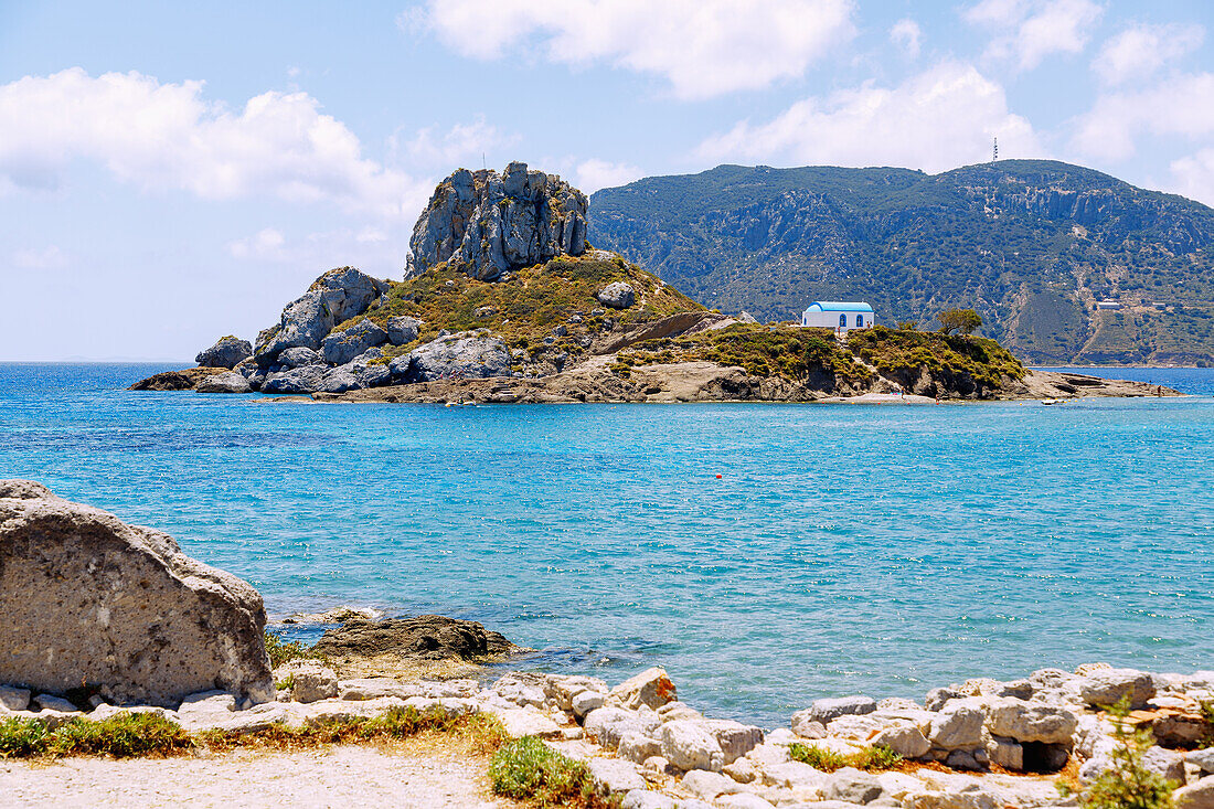  Island of Kastri with the chapel of Agios Nikolaos and the bay of Kefalos on the island of Kos in Greece 