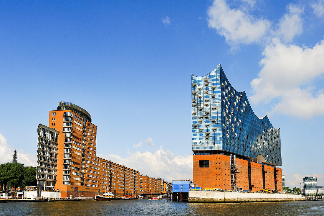 Elbphilharmonie , a concert hall built on top of an old warehouse building (by Swiss architecture firm Herzog & de Meuron), view from a ferry on Elbe river, HafenCity quarter, Hamburg, Germany, Europe