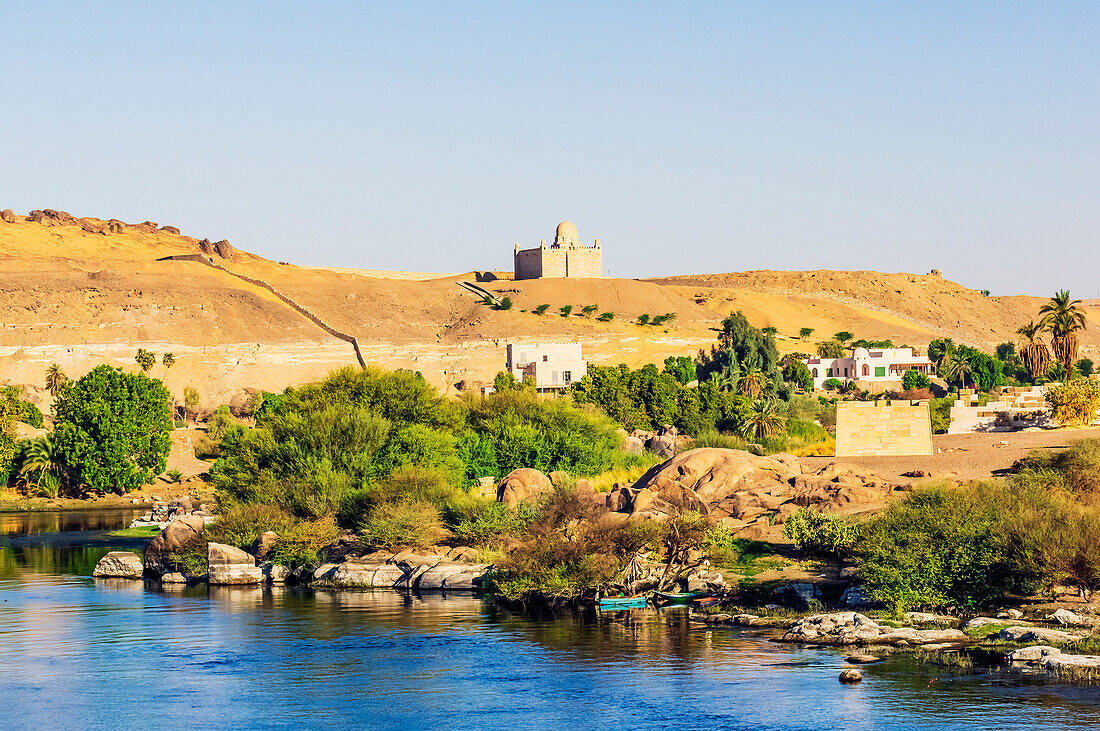  Nile section near Aswan, Egypt, typical landscape and mausoleum of Agha Khan 