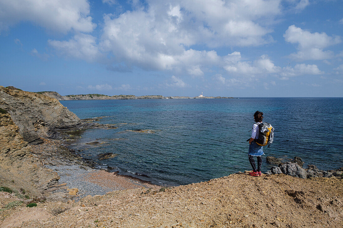 hiker on Tortuga beach, s'Albufera des Grau Natural Park, Menorca, Balearic Islands, Spain