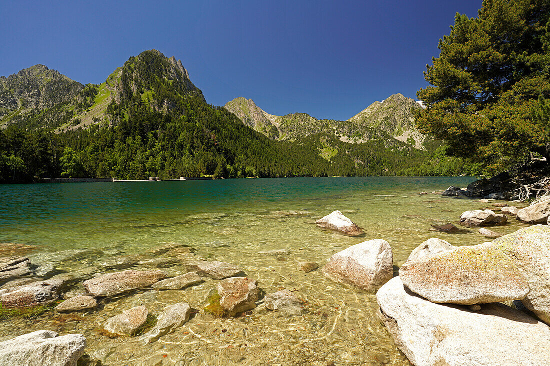  The Estany de Sant Maurici lake in the Aigüestortes i Estany de Sant Maurici National Park, Catalonia, Spain, Europe 