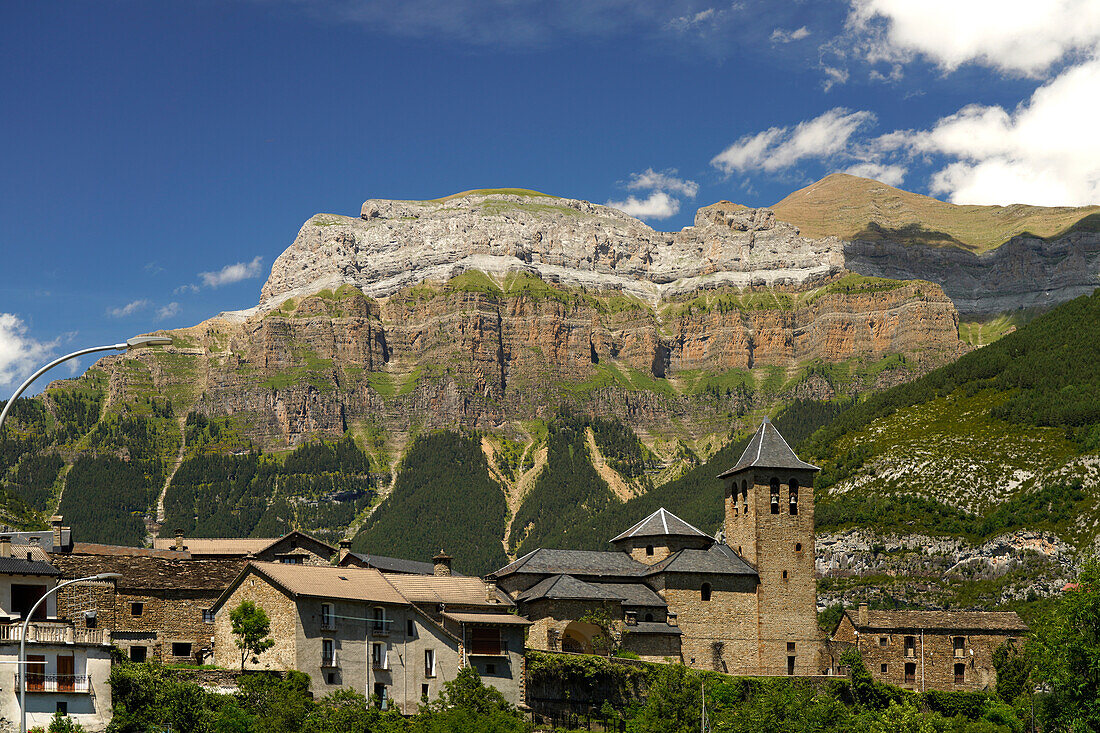  The church Iglesia de San Salvador in Torla and the Monte Perdido massif in Torla-Ordesa, Spain, Europe 