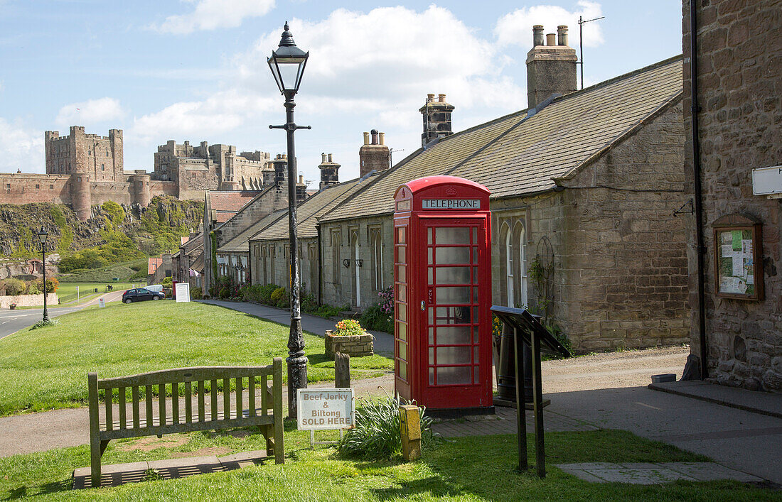 Bamburgh castle and village, Northumberland, England, UK