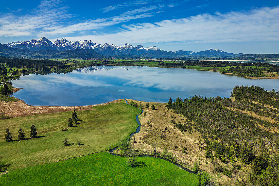  Bannwaldsee with Tannheimer Mountains in the background, Lake Constance-Königssee cycle path, Bannwaldsee, Allgäu, Swabia, Bavaria, Germany 