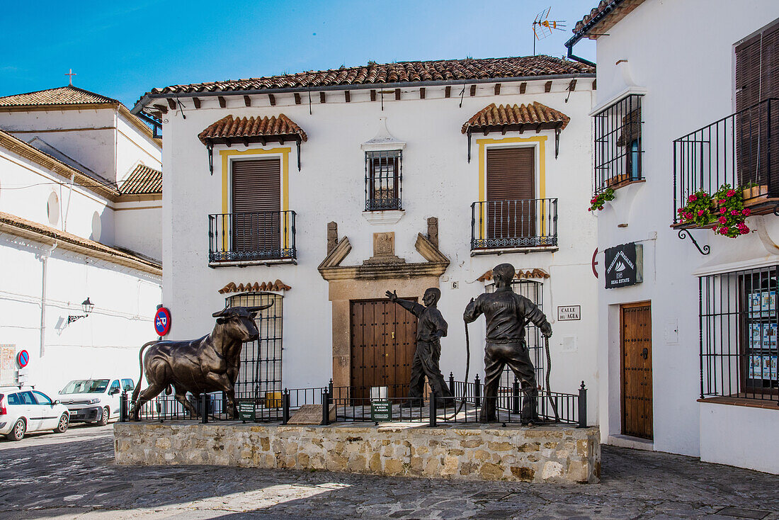  Grazalema, white village in the Sierra de Grazalema, bullfighting scene; in the city center, Cadiz province, Spain 