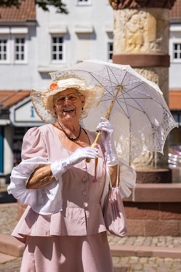  Woman in costume of the sister of Dorothea Grimm (mother of the Brothers Grimm), Steinau an der Straße, Spessart-Mainland, Hesse, Germany 